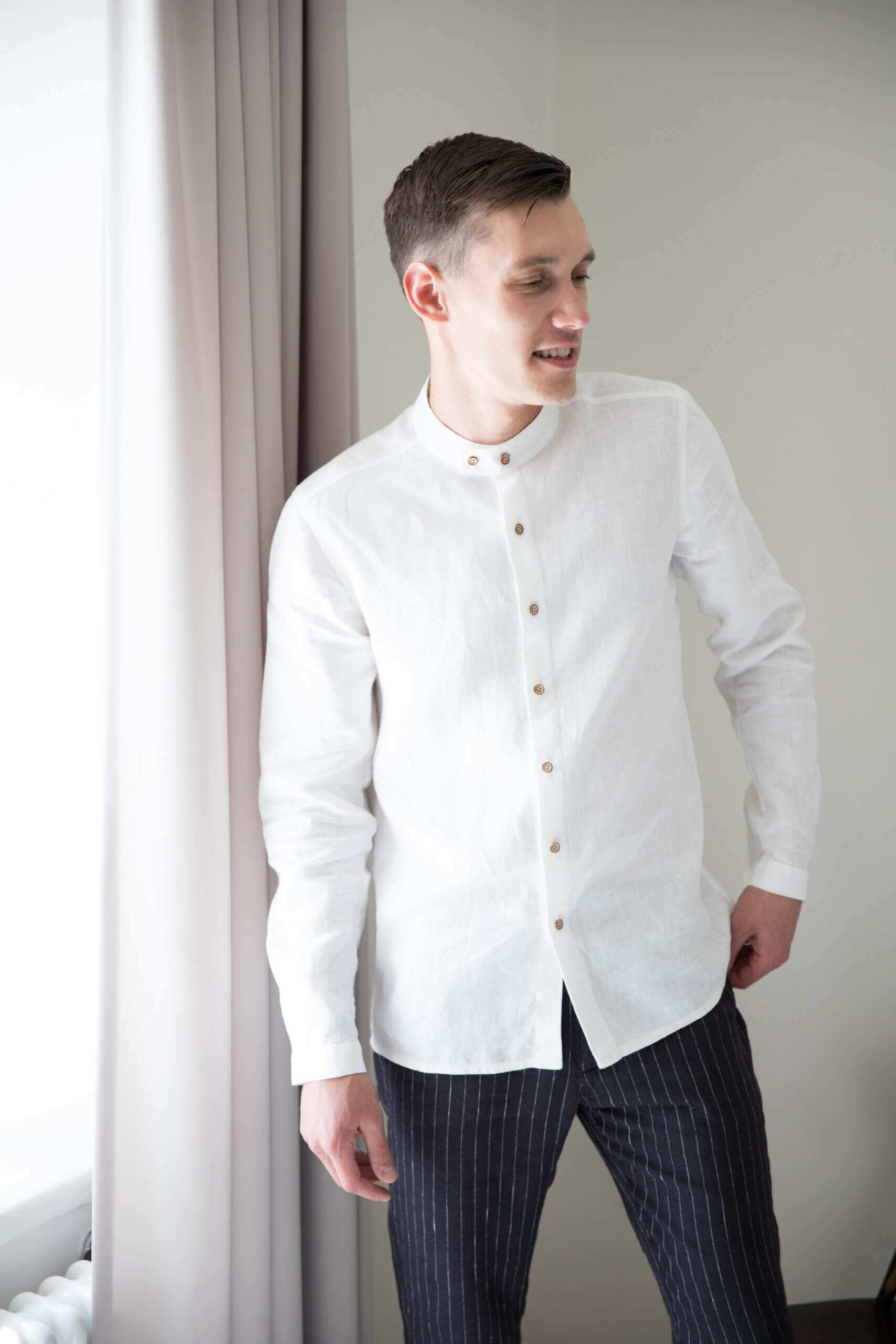 White linen shirt paired elegantly with capri pants