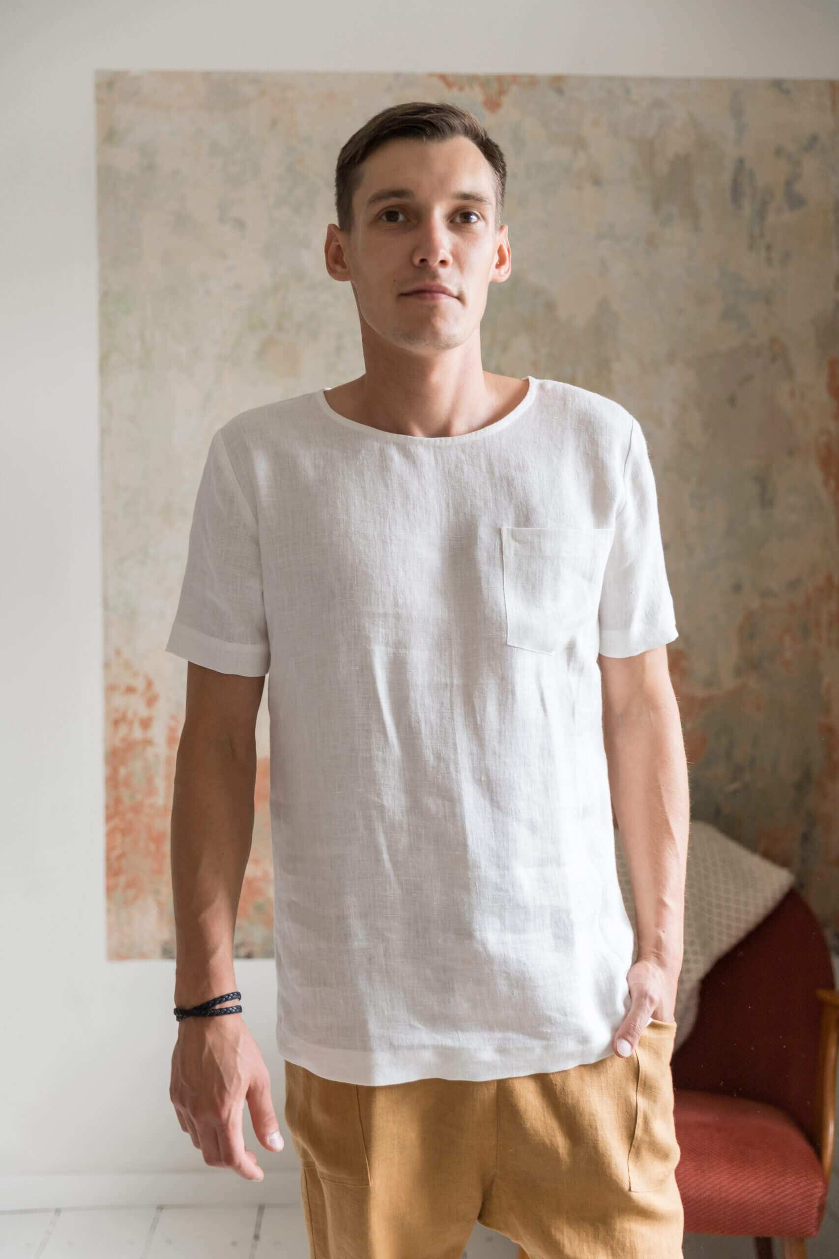 Front view of men's long-line linen t-shirt in white