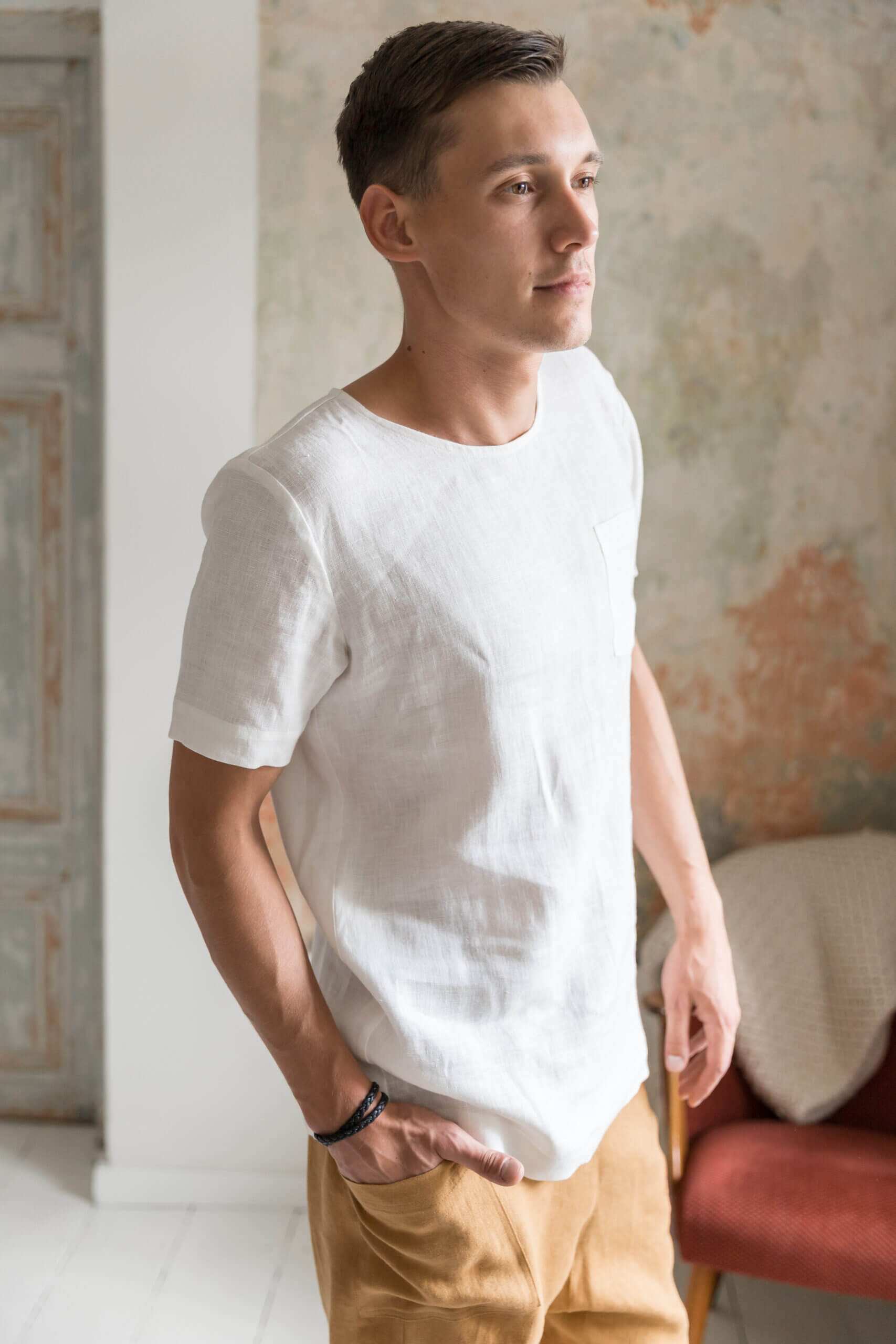 Close-up details of white long-line linen t-shirt fabric